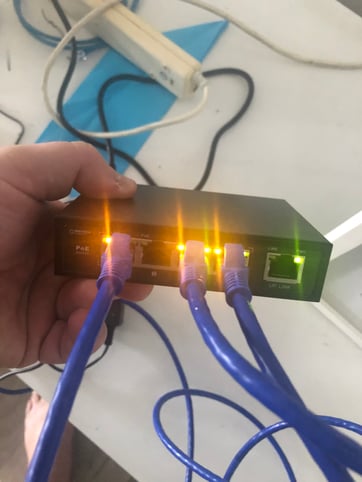 Back of the PoE switch connected to router