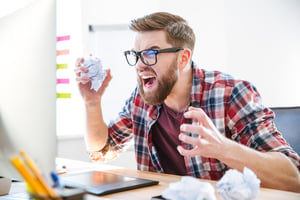 angry payroll staff yelling at computer