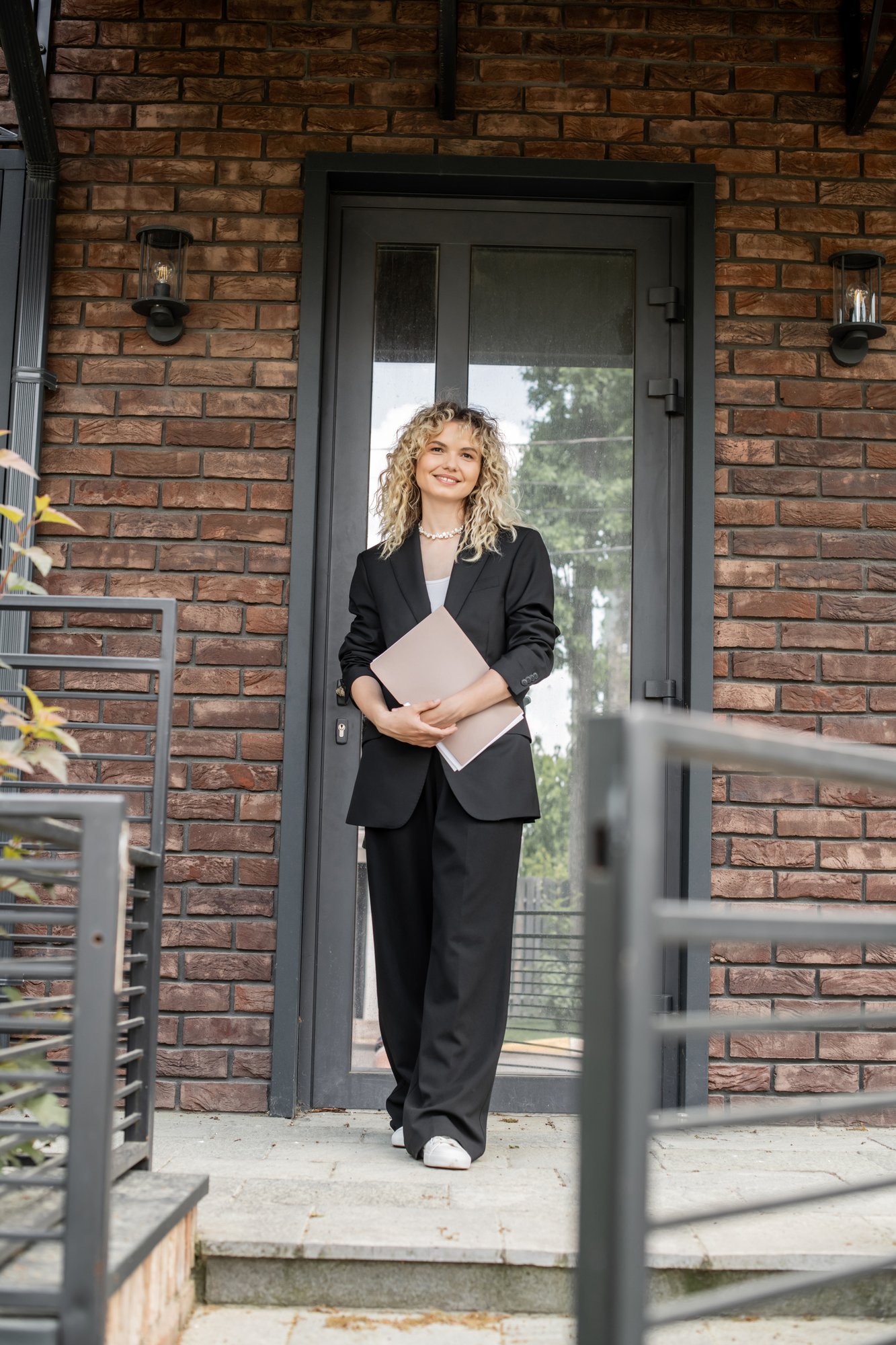 full-length-of-stylish-and-confident-realtor-stand-2024-11-15-14-25-38-utc